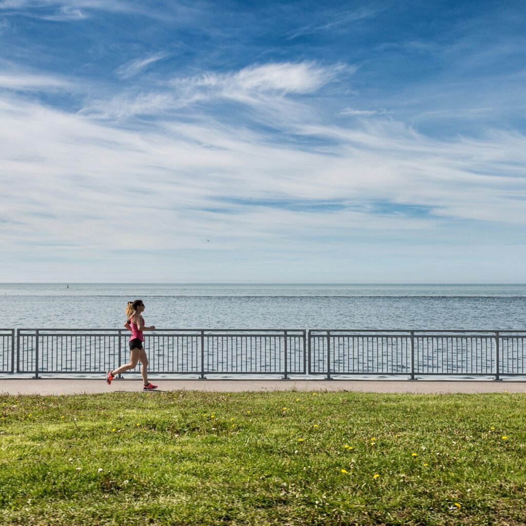 running coach by the sea