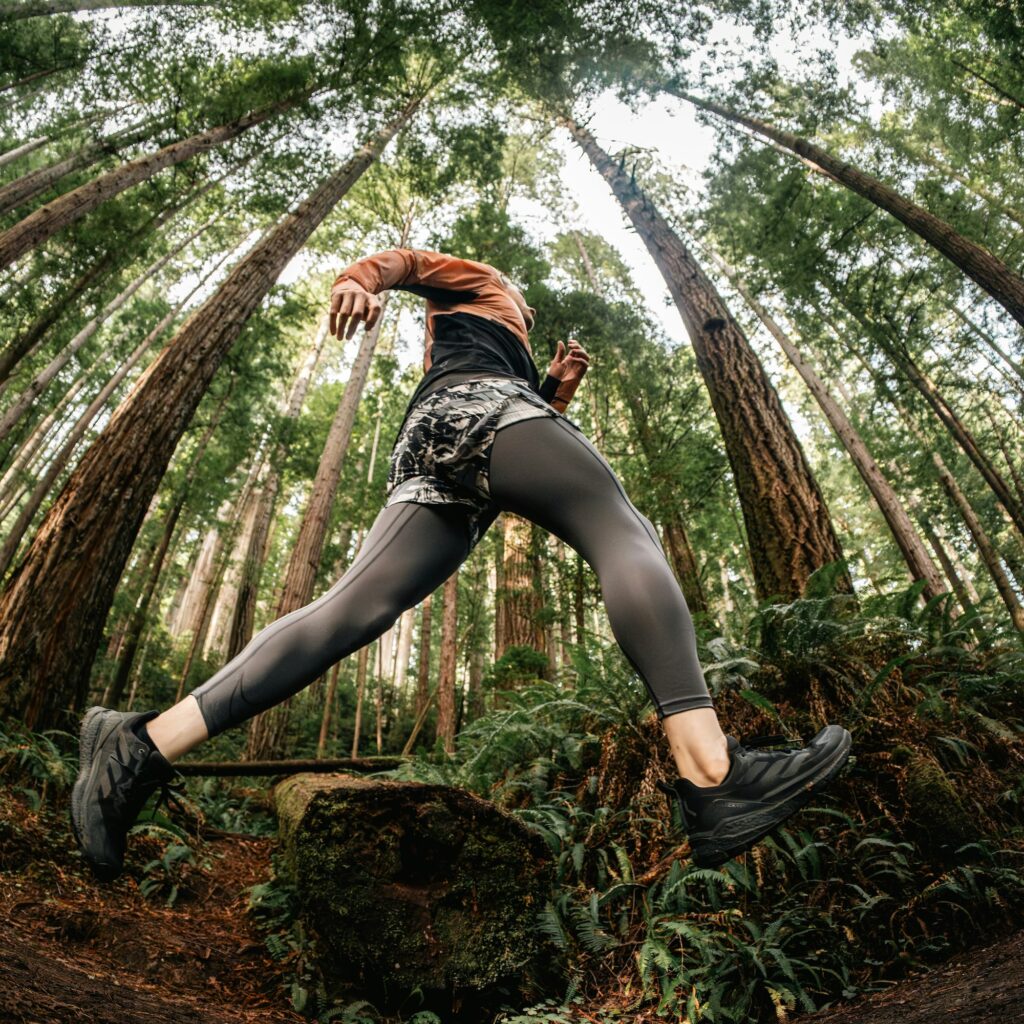running coach cardiff running through the woods