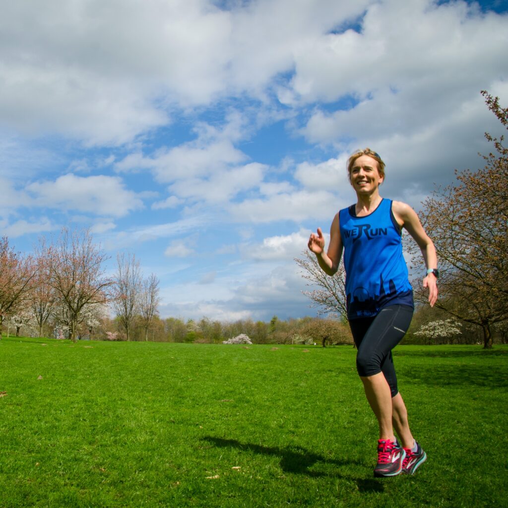 running coach london woman wearing blue