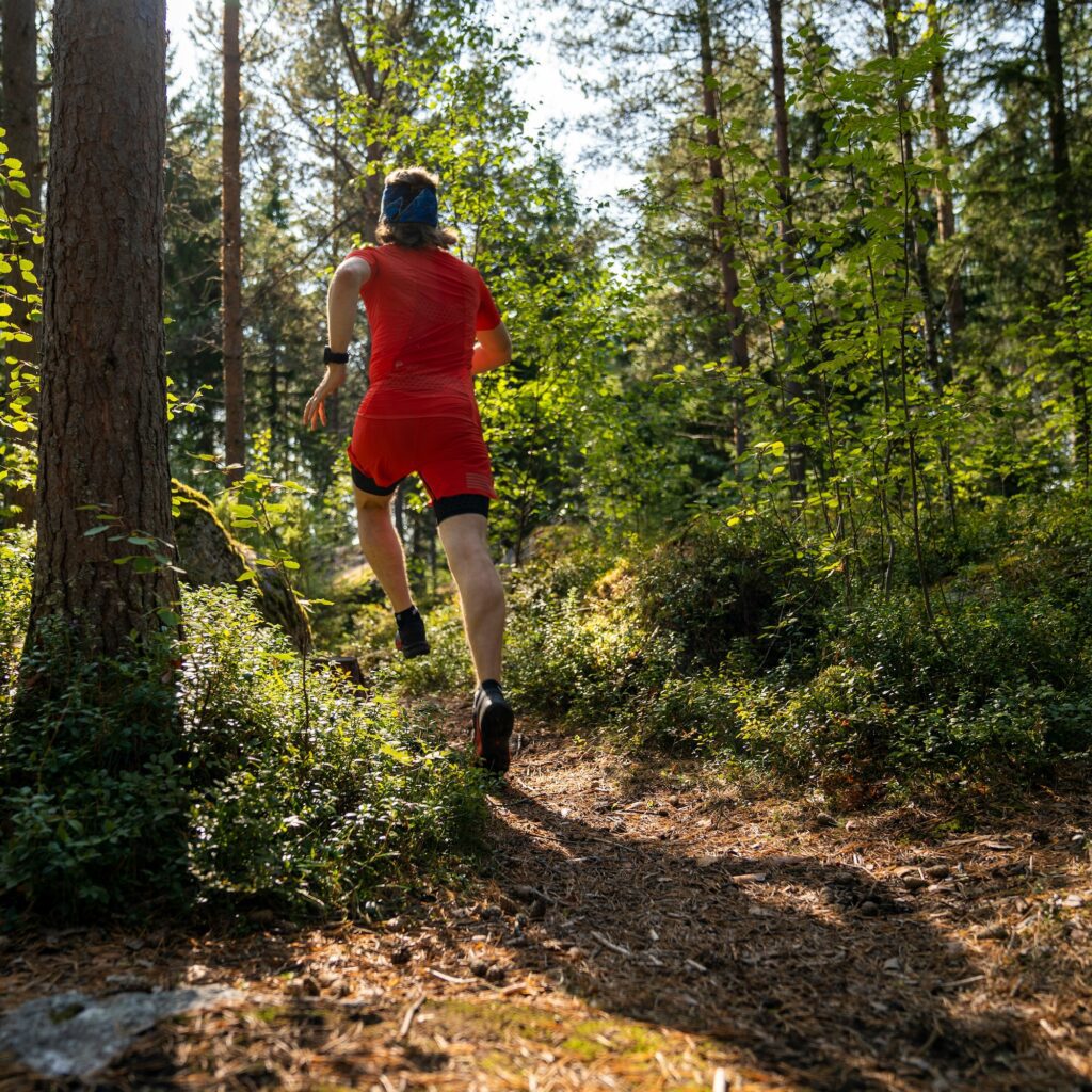 running coach reading man in red clothes